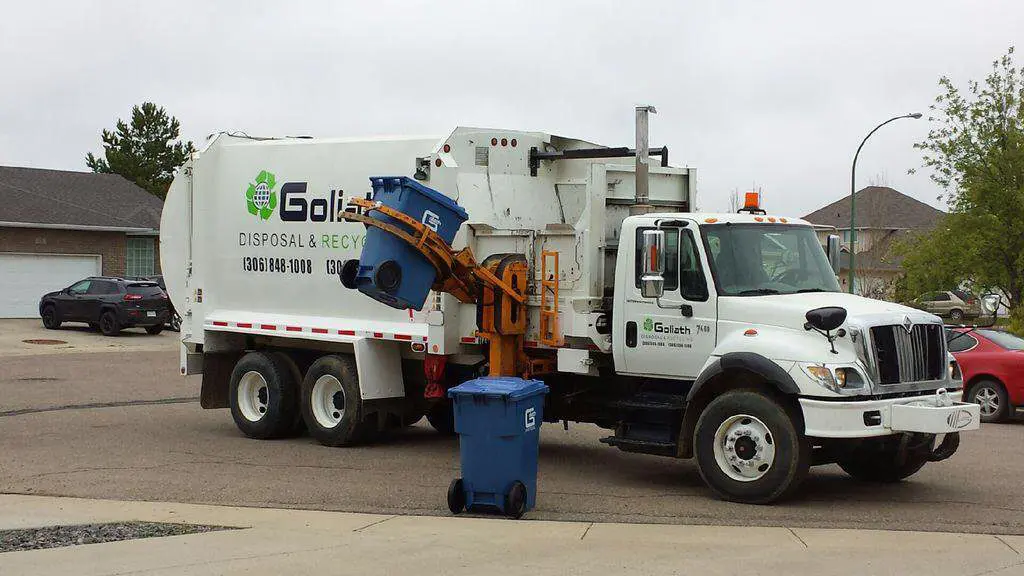 Goliath Disposal Truck picking up garbage cart